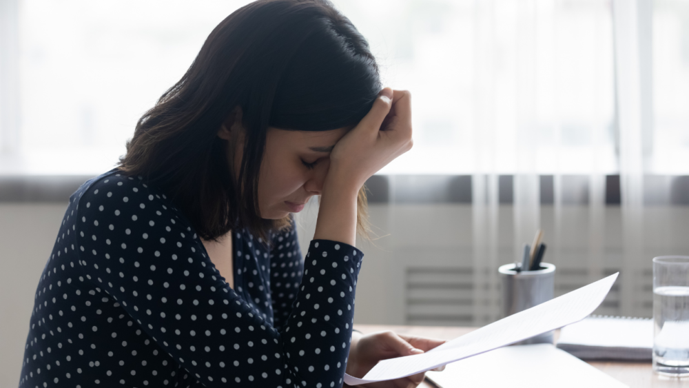 Woman stressed about student loans